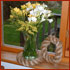 A stand for a round bottomed vase made from a Manila rope ring
